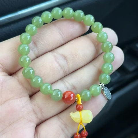 Gelang Giok Hetian Alami Warna hijau kekuningan Kualitas sempurna Ukuran 8mm Giok halus dan hangat Gaya yang indah sudah termasuk pajak pengiriman.
