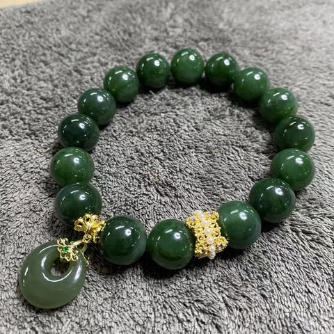 Gelang Jasper Halus dengan Titik Tinta Alami Ukuran 12mm Sudah termasuk pajak pengiriman.