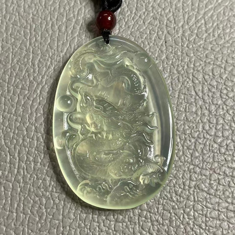 Liontin giok alami 50 * 34mm termasuk ongkos kirim dan pajak.