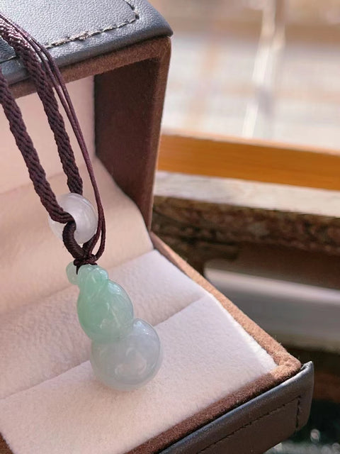 Liontin labu labu Jadeite alami dengan tekstur hangat Ukuran 25 * 14 Tebal 13,5 mm Sudah termasuk pajak pengiriman.