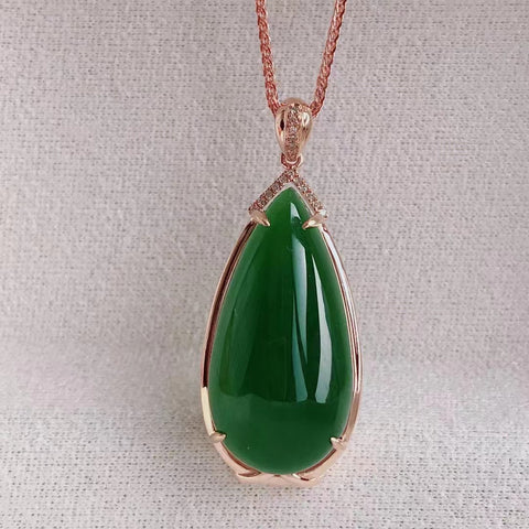 Kalung giok giok bersih dan halus dengan pengaturan emas 18 karat Ukuran 12 * 25mm Sudah termasuk ongkos kirim dan pajak.