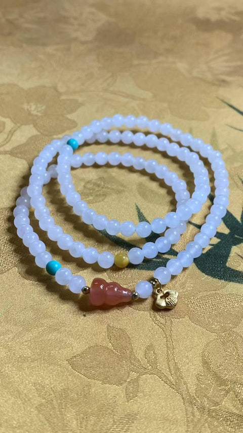 Gelang tiga lingkaran giok Hetian yang indah, serasi dengan aksesori Nanhong dan lilin madu. Spesifikasi: 5,1 mm, termasuk ongkos kirim dan pajak.