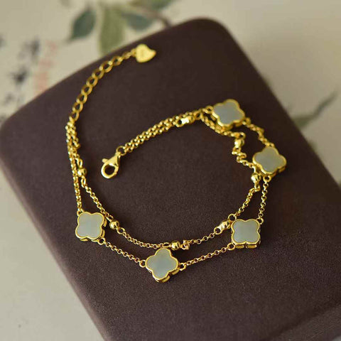 Gelang perak 6088-2s925 dengan batu giok Hetian, manik-manik air bening, dan semanggi berdaun empat. Ukuran batu lepas: 8*8, termasuk ongkos kirim dan pajak.