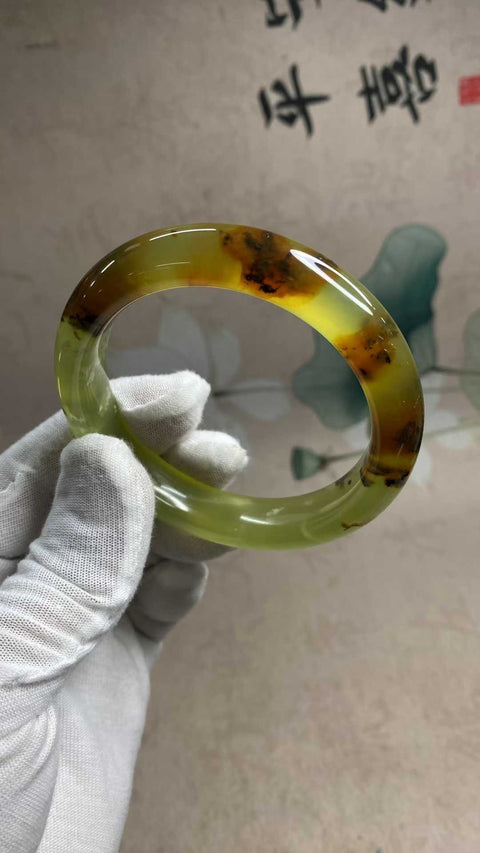 Gelang giok Xiuyan multi-warna yang indah, diameter dalam: 58,6 mm, lebar tepi: 13,3 mm. Semua batu terbentuk secara alami. Biaya kirim dan pajak sudah termasuk.