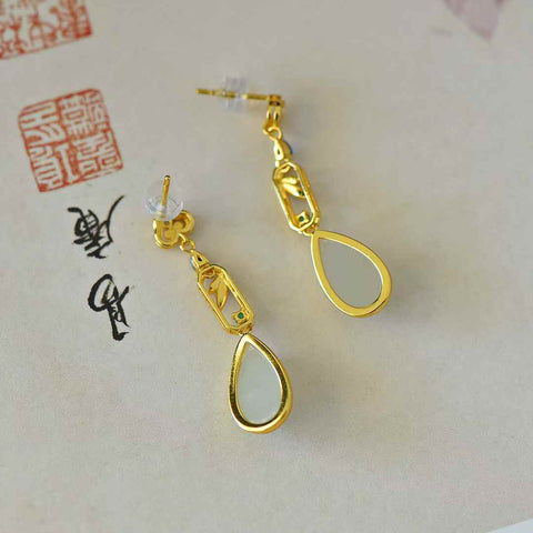 8114-2# 925 perak bertatahkan giok Hetian (8*14), anting-anting enamel daun bambu berbentuk tetesan air mata giok putih, gioknya hangat dan halus, desainnya baru dan unik, termasuk biaya pengiriman dan pajak.