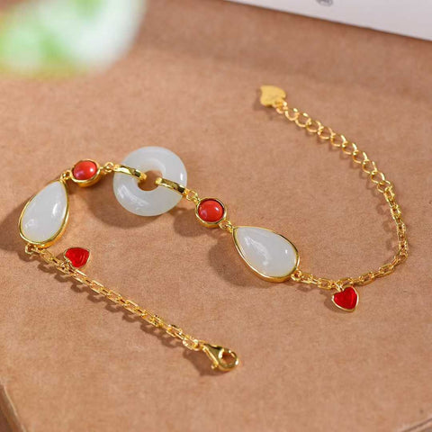 🎀🎀🎀8329-2# Gelang liontin berbentuk hati berbahan perak sterling 925 bertatahkan giok Hetian. Desain unik dan baru, pengerjaan yang sangat indah, sungguh luar biasa. Dimensi giok: 15*15 cm. Biaya pengiriman dan pajak sudah termasuk.