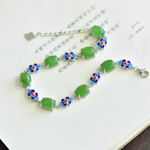 Gelang cabochon enamel giok Hetian bertatahkan perak 18088#925, desain sederhana, kualitas giok asli, segar dan elegan, sangat indah. Ukuran giok: 7*9 cm. Biaya pengiriman dan pajak sudah termasuk.