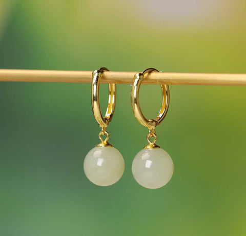 Anting-anting perak sterling 925 5202Q-2# bertatahkan manik-manik giok Hetian, menampilkan desain sederhana dan unik, penuh keberuntungan, dengan kualitas giok yang halus. Dimensi giok: 10*10 cm. Termasuk ongkos kirim dan pajak.