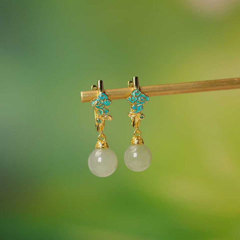 Anting-anting perak sterling 925 5213Q-2#925 bertatahkan manik-manik giok Hetian, menampilkan desain baru dan unik, penuh keberuntungan, dengan kualitas giok yang halus. Dimensi giok: 8*8 cm. Termasuk ongkos kirim dan pajak.