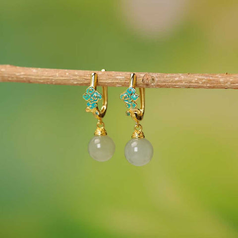 Anting-anting perak sterling 925 5213Q-2#925 bertatahkan manik-manik giok Hetian, menampilkan desain baru dan unik, penuh keberuntungan, dengan kualitas giok yang halus. Dimensi giok: 8*8 cm. Termasuk ongkos kirim dan pajak.