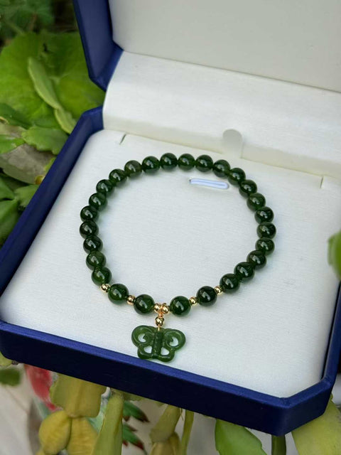 Gelang giok Hetian warna hijau bayam, ukiran kupu-kupu buatan tangan, melambangkan berkah yang melimpah. ~ Ukuran sekitar 6mm. Termasuk ongkos kirim dan pajak.