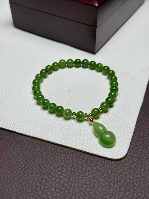Gelang kiwi giok Hetian, warna hijau cerah, dipadukan dengan labu ukiran tangan. Ukuran perkiraan: 6mm. Termasuk ongkos kirim dan pajak.