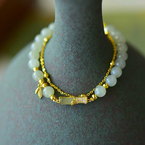Gelang zirkon daun bambu berbentuk bambu (5*9) bertatahkan giok Hetian dari perak 925 6095-2#. Gioknya hangat dan lembut, dan desainnya baru dan unik. Ongkos kirim dan pajak sudah termasuk.