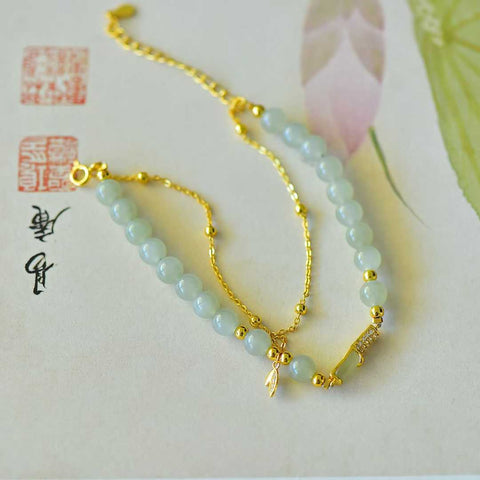 Gelang zirkon daun bambu berbentuk bambu (5*9) bertatahkan giok Hetian dari perak 925 6095-2#. Gioknya hangat dan lembut, dan desainnya baru dan unik. Ongkos kirim dan pajak sudah termasuk.