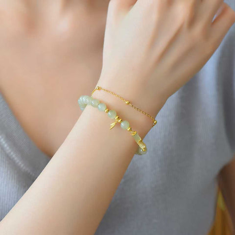 Gelang zirkon daun bambu berbentuk bambu (5*9) bertatahkan giok Hetian dari perak 925 6095-2#. Gioknya hangat dan lembut, dan desainnya baru dan unik. Ongkos kirim dan pajak sudah termasuk.