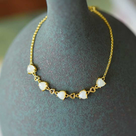 6096-2# Gelang Zirkon Berbentuk Hati (5*5) dengan Batu Giok Hetian Bertatahkan Perak 925. Batu gioknya hangat dan lembut, dan desainnya baru dan unik. Ongkos kirim dan pajak sudah termasuk.