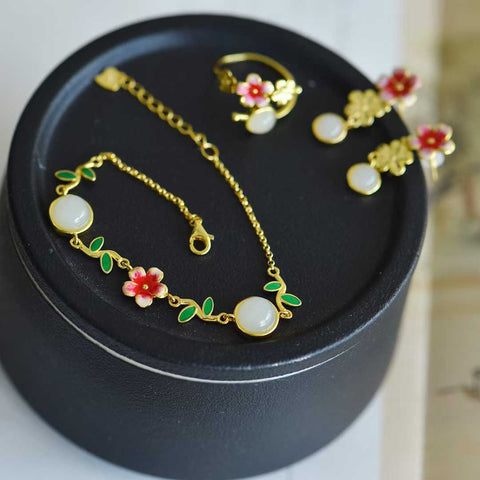 Anting: 7750-2; Cincin: 9397-2; Gelang: 8274-2. Set terlaris tersedia! # Set perak S925 dengan desain bunga persik giok Hetian, sederhana dan elegan! Ongkos kirim dan pajak sudah termasuk.