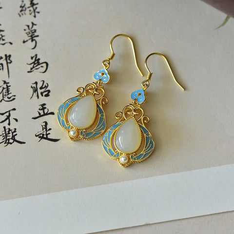 s925 perak dengan giok wada drop ruyi dengan anting-anting enamel mutiara 2867-2, ukuran batu : 8 * 12 mm termasuk pajak pengiriman