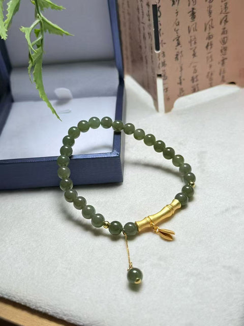 Gelang giok Hetian warna hijau danau, melambangkan kemajuan berkelanjutan 🎍 dipadukan dengan aksesoris perak 925. Ukuran: 6mm. Termasuk ongkos kirim dan pajak.