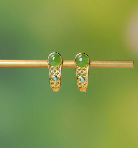 17192-2# Anting-anting filigran berbentuk drum bulat bertatahkan giok Hetian dari perak sterling 925. Desain baru dan unik, penuh keberuntungan, kualitas giok yang bagus, ukuran giok: 5*5 cm. Termasuk ongkos kirim dan pajak.