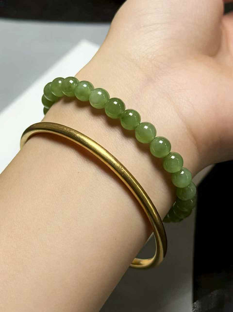 Gelang giok nefrit Hetian, dengan tekstur hangat dan lembut, desain sederhana dan elegan. Untaian berlapis menambah keindahan. Ukuran perkiraan: 6mm. Termasuk ongkos kirim dan pajak.