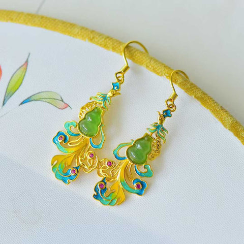 17149-2# Anting-anting labu dan burung phoenix bertatahkan giok Hetian dari perak sterling 925. Gioknya halus dan hangat saat disentuh, dengan desain yang baru dan unik. Dimensi giok: 5*7 cm. Harga sudah termasuk ongkos kirim dan pajak.