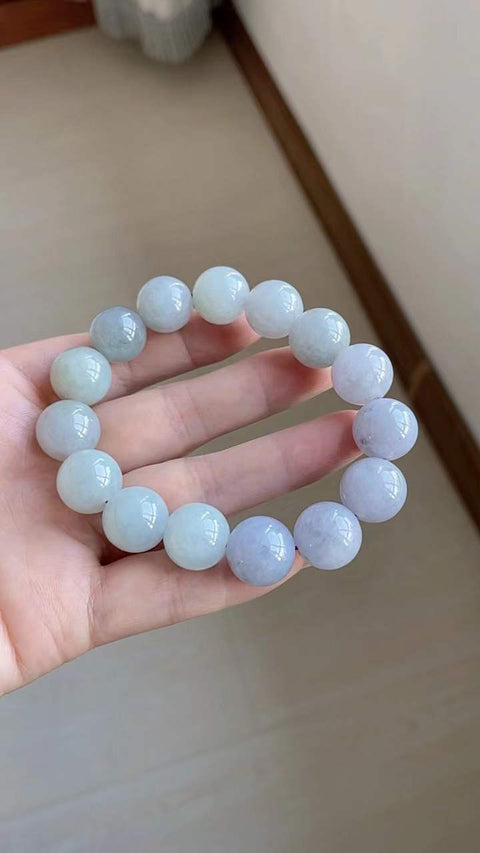 Gelang giok alami, terbuat dari material tambang lama, dengan tekstur halus dan hangat, transparansi yang sangat baik, dan warna ungu muda. Ukuran: 1,4 cm. Termasuk ongkos kirim dan pajak.