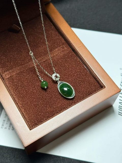 Kalung Tulang Selangka Perak Sterling 925 Bertatahkan Giok dan Koin/Batang Tembaga, melambangkan kekayaan dan kemakmuran. Perkiraan dimensi: 14 x 10 mm. Termasuk ongkos kirim dan pajak.