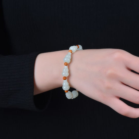 Gelang giok Hetian dari batu giok berbentuk labu yang melambangkan keberuntungan dan kemakmuran, batu utama 5036#, ukuran: 10*15 mm. Termasuk ongkos kirim dan pajak.