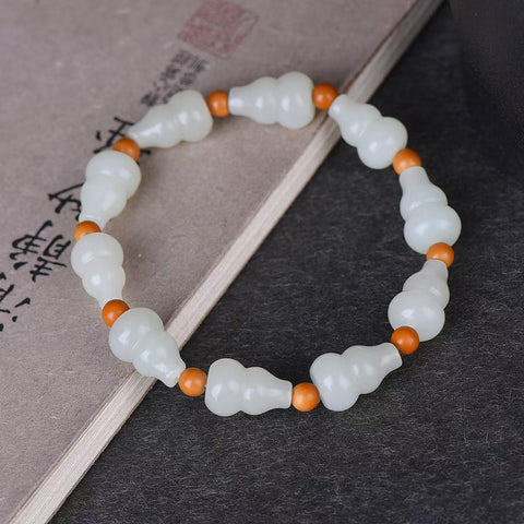 Gelang giok Hetian dari batu giok berbentuk labu yang melambangkan keberuntungan dan kemakmuran, batu utama 5036#, ukuran: 10*15 mm. Termasuk ongkos kirim dan pajak.