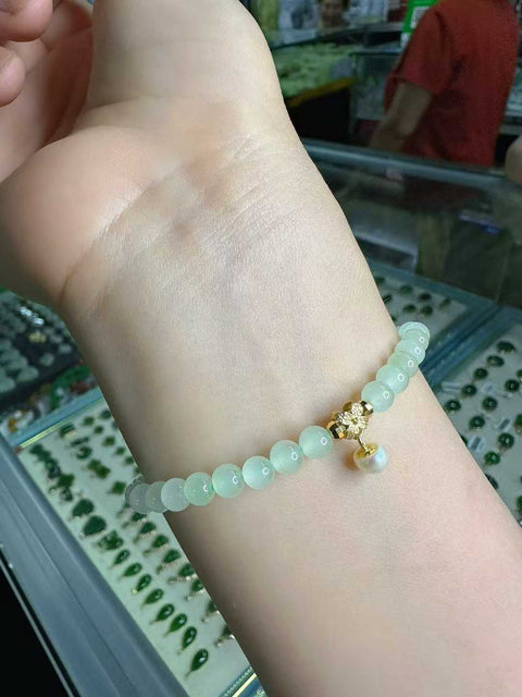 Gelang giok Hetian dari Qinghai, terbuat dari giok mentah, berukuran 5mm, dipadukan dengan perak sterling 925 dan mutiara. Harga sudah termasuk ongkos kirim dan pajak.