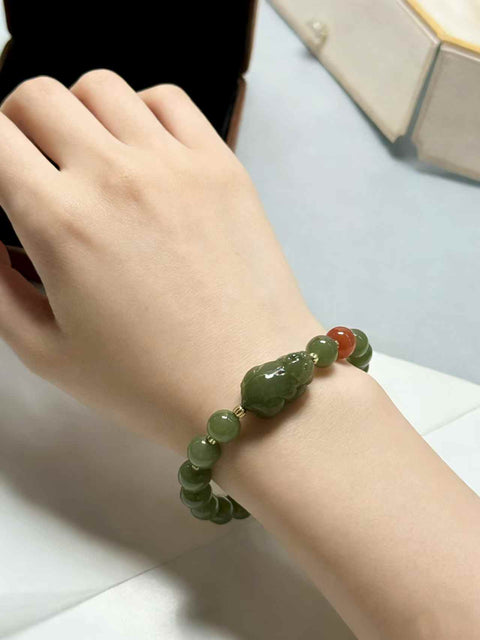 Gelang Pixiu dari giok Hetian berwarna kuning kehijauan, Pixiu untuk menarik kekayaan dan menangkal kejahatan! Ukuran: sekitar 8mm. Termasuk ongkos kirim dan pajak.