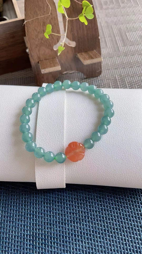 Gelang giok alami, material tambang lama, tekstur halus dan hangat, warna biru kehijauan yang indah, terlihat menawan saat dikenakan. Kualitas material batch ini sangat bagus, ukuran 0.8, termasuk ongkos kirim dan pajak, nomor barang 202604141458.