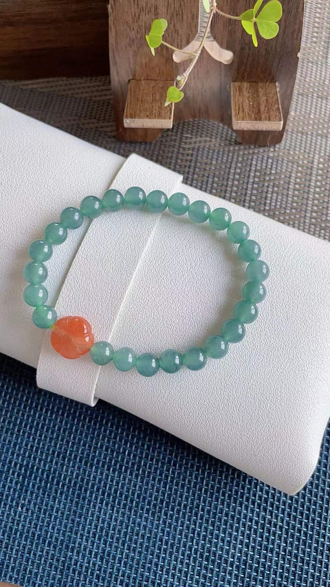 Gelang giok alami, material tambang lama, tekstur halus dan hangat, warna biru kehijauan yang indah, terlihat menawan saat dikenakan. Kualitas material batch ini sangat bagus, ukuran 0.8, termasuk ongkos kirim dan pajak, nomor barang 202604141458.