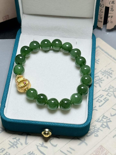 Gelang giok nefrit Hetian, membawa kekayaan dan keberuntungan~ Terlihat indah di pergelangan tangan~ Ukuran: sekitar 10mm. Termasuk ongkos kirim dan pajak.