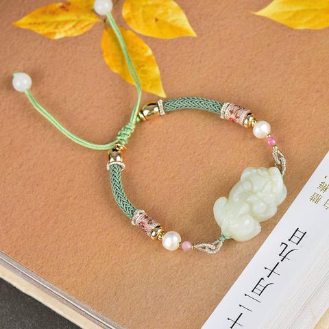Gelang Pixiu giok putih Hetian, #1669/ 12*27. Ukiran indah, kualitas giok yang bagus, melambangkan kekayaan dan kemakmuran. Termasuk ongkos kirim dan pajak.
