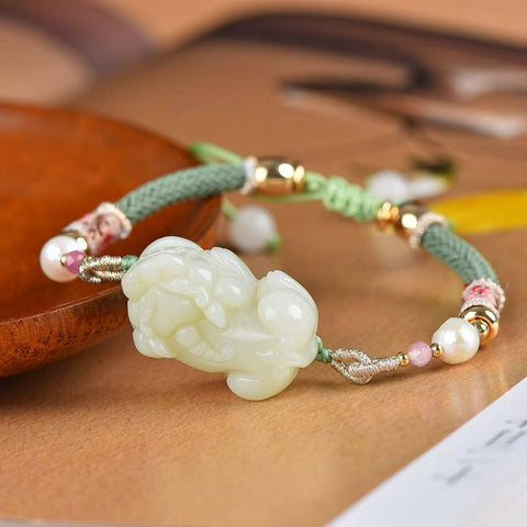 Gelang Pixiu giok putih Hetian, #1669/ 12*27. Ukiran indah, kualitas giok yang bagus, melambangkan kekayaan dan kemakmuran. Termasuk ongkos kirim dan pajak.