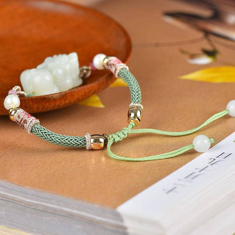 Gelang Pixiu giok putih Hetian, #1669/ 12*27. Ukiran indah, kualitas giok yang bagus, melambangkan kekayaan dan kemakmuran. Termasuk ongkos kirim dan pajak.