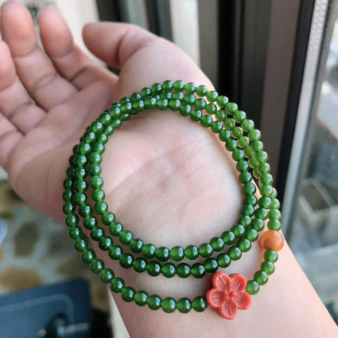 Saat warna hijau nefrit dan merah karnelian bertemu di pergelangan tangan Anda, kombinasi gelang/kalung ini menampilkan nefrit 4mm, karnelian alami berkualitas tinggi, dan amber. Ongkos kirim dan pajak sudah termasuk.
