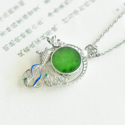 🐠🐠🐠16117#925 liontin perak sterling bertatahkan giok Hetian, menampilkan desain "kelimpahan tahun demi tahun" (ikan melambangkan keberuntungan). Dimensi giok: 12*12 mm. Harga sudah termasuk ongkos kirim dan pajak.