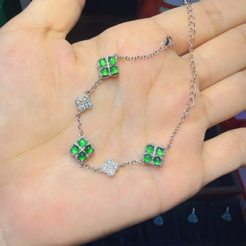 Gelang daun semanggi empat helai dan tiga bunga, rangka perak sterling 925, termasuk ongkos kirim dan pajak.