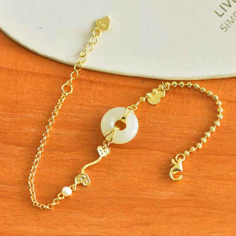 【Nama】Cincin Perdamaian Giok Hetian Bertatahkan Perak Sterling S925 dengan Gelang Ruyi Mutiara  【Nomor Barang】6071-2  【Spesifikasi】Batu Kasar: 13*13 cm Termasuk ongkos kirim dan pajak.