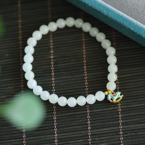 3176# Gelang giok putih Hetian dipadukan dengan perak S925, model kuda goyang, 6mm, 29 butir. Gelang manik-manik giok putih yang indah, warnanya yang lembut memancarkan keanggunan feminin. Termasuk ongkos kirim dan pajak.