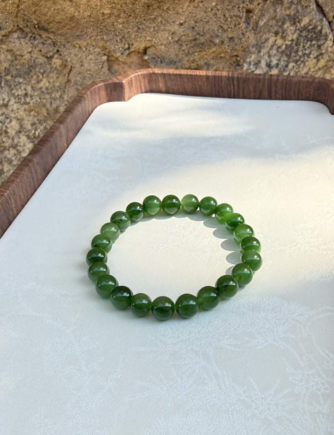 Gelang giok Hetian nefrit dengan bintik tinta nefrit alami, berukuran sekitar 8mm. Harga sudah termasuk ongkos kirim dan pajak.