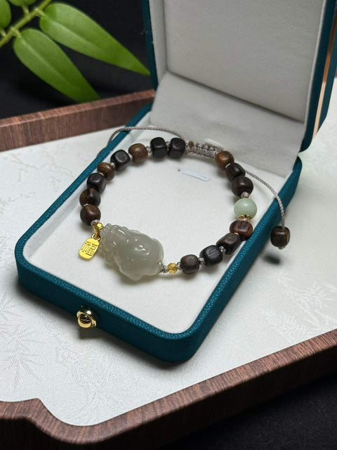 Gelang gaharu Pixiu giok Hetian | Gaya antik, kayu dan giok untuk menarik kekayaan. Ukuran sekitar 25×16×10mm. Termasuk ongkos kirim dan pajak.