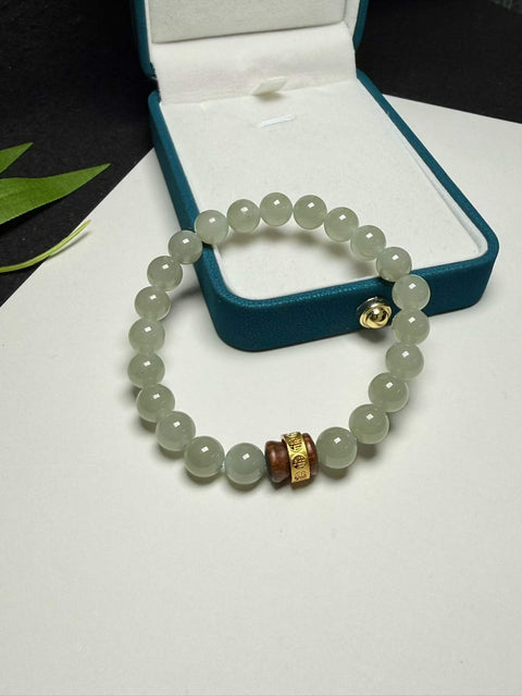 Gelang giok Hetian Qiemo biru dengan warna biru keabu-abuan berkualitas tinggi. Ukuran: sekitar 8mm. Harga sudah termasuk ongkos kirim dan pajak.