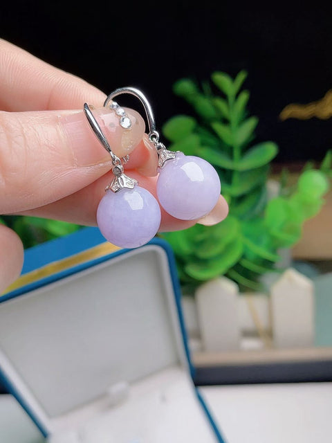 Anting-anting giok alami, warna ungu yang indah, terbuat dari perak 925, ukuran 1,2 mm. Harga sudah termasuk ongkos kirim dan pajak.