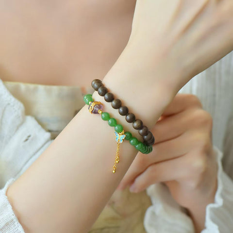 3185# Gelang giok Hetian (jadeit) dipadukan dengan kayu gaharu Brunei, perak S925, kupu-kupu, dan kristal dengan desain lingkaran ganda. Gaharu 6mm + kupu-kupu perak S925 dan kristal. Termasuk ongkos kirim dan pajak.