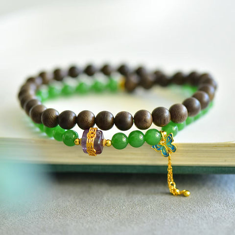 3185# Gelang giok Hetian (jadeit) dipadukan dengan kayu gaharu Brunei, perak S925, kupu-kupu, dan kristal dengan desain lingkaran ganda. Gaharu 6mm + kupu-kupu perak S925 dan kristal. Termasuk ongkos kirim dan pajak.
