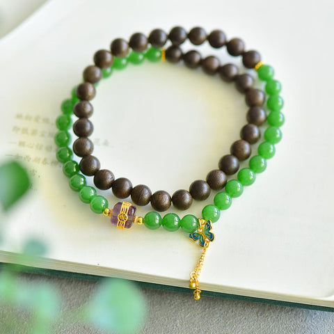 3185# Gelang giok Hetian (jadeit) dipadukan dengan kayu gaharu Brunei, perak S925, kupu-kupu, dan kristal dengan desain lingkaran ganda. Gaharu 6mm + kupu-kupu perak S925 dan kristal. Termasuk ongkos kirim dan pajak.